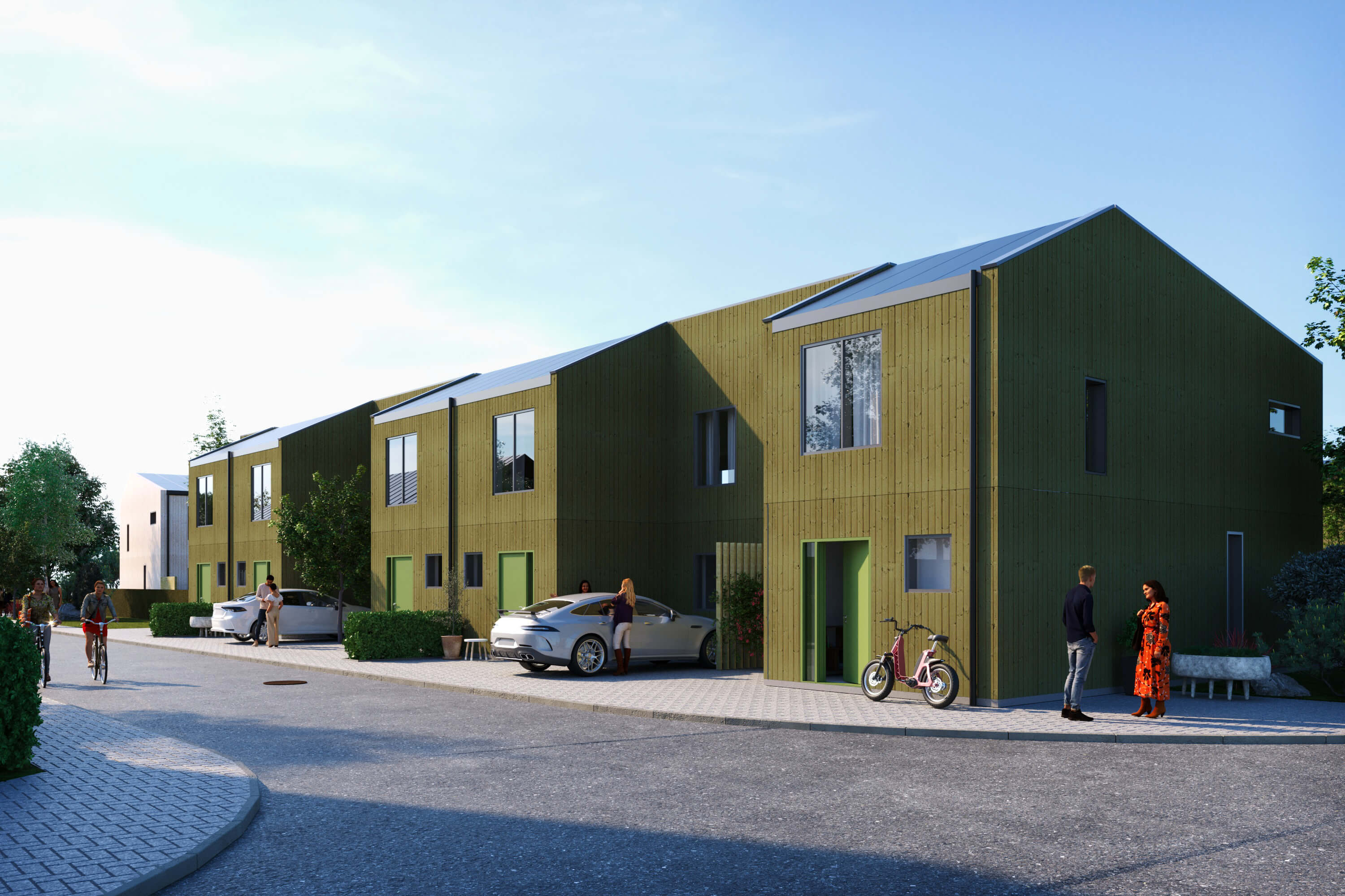 gata på villaområde med gröna radhus